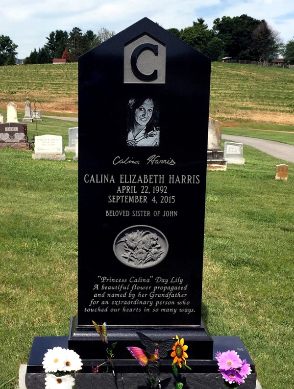 Rock of Ages Black granite headstone with portrait