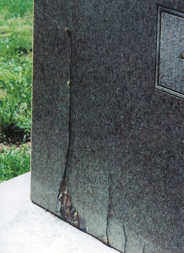 low quality granite headstone with crack-1-1
