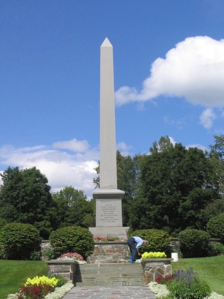 Joseph Smith Memorial surrounded by flowers and landscaping in beautiful Vermont 
