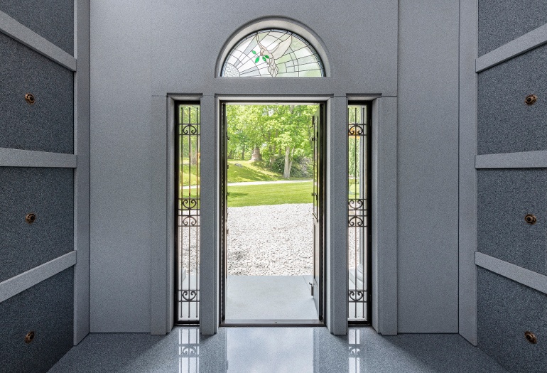 Blue Gray_Chambers Mausoleum_Interior image_door entry_stained glass windw_Megan Booth-1